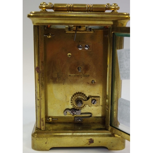 5 - An early 20th century lacquered brass carriage clock