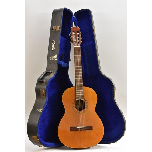 3060 - An Aria A551 model, acoustic guitar, serial no. 38057, complete with case.