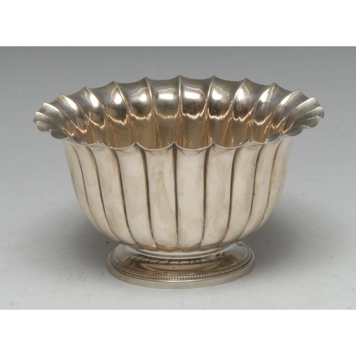 581 - A Continental silver fluted circular bowl, probably German, outswept rim, circular foot outlined wit... 