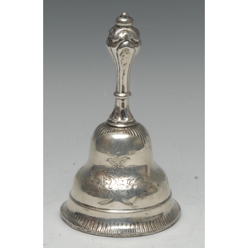 584 - A Dutch silver ogee table bell, engraved and chased with flowers and scrolling foliage, acanthus kno... 