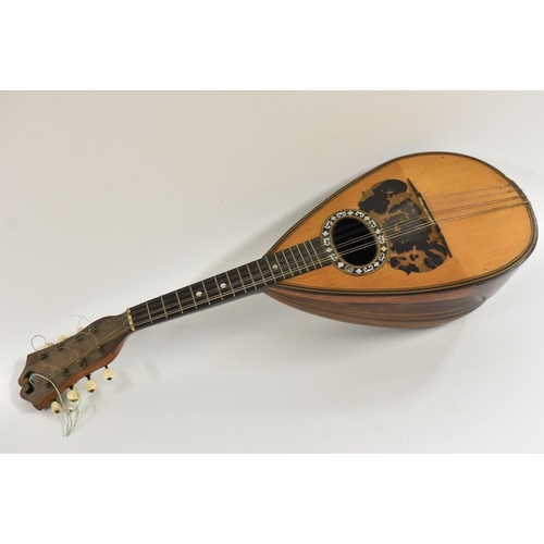 3111 - A Mandolin by Domenico Banoni of Naples, 8 strings, 21 rib back, length 60.5cm.