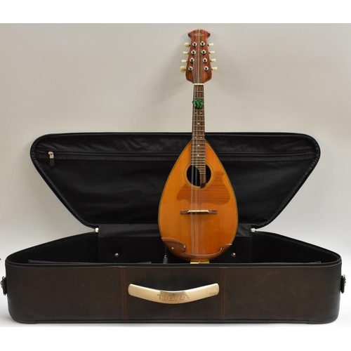 3123 - A Fine, 20th century, 8-string Mandolin by Marque, 15 rib back, cedar soundboard, mahogany body and ... 