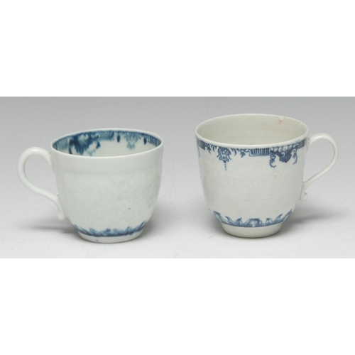 70 - A Worcester Chrysanthemum moulded coffee cup, painted in underglaze blue, crescent marks, c.1765; an... 