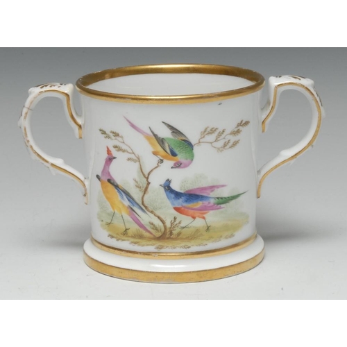 73 - An early 19th century Chamberlain Worcester loving cup, well painted with exotic birds, the interior... 