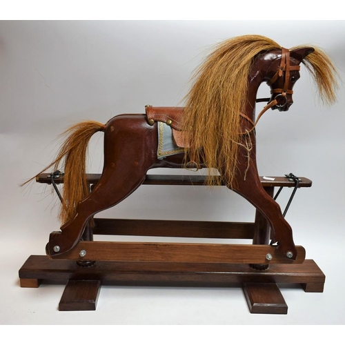 5003 - A small table-top rocking horse, pivoting frame, 50cm high