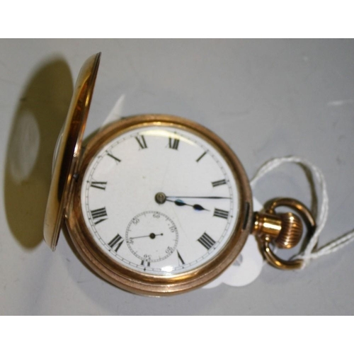 5212 - A Dennison Star gold plated half hunter pocket watch, enamel dial, bold Roman numerals, subsidiary s... 