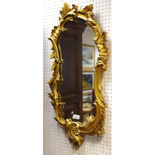 159 - A 20th century giltwood looking glass