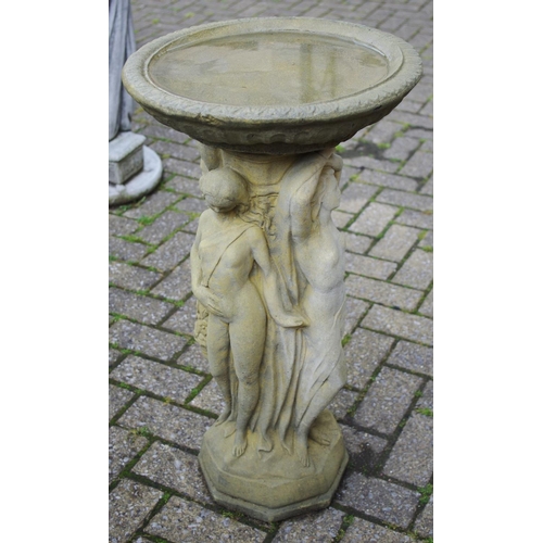 172A - Garden Statuary - an English Stone inc quartz bird bath, the column in relief with the Three Graces,... 