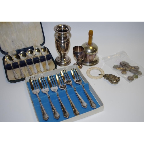 229 - A silver baluster shaped spill vase, Chester, 1922; a cased set of 6 silver spoons; an EPNS bell, a ... 