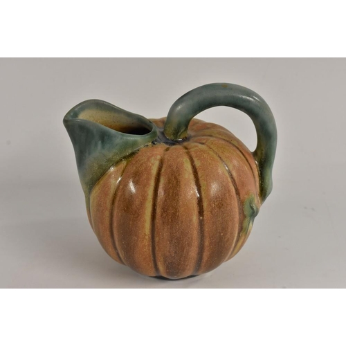 3033 - An unusual Bourne Denby lobed ovoid pumpkin shaped jug, loop handle, lipped spout, 13.5cm high, prin... 