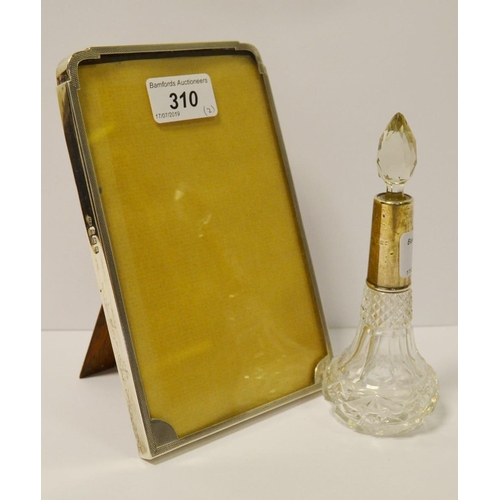 310 - A silver Art Deco easel photo frame, Birmingham 1928; a silver mounted scent bottle London 1923 (2)