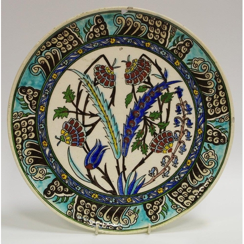 33 - A large Persian Iznic pottery dish