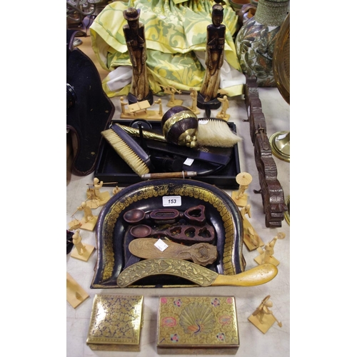 153 - An ebony silver mounted dressing table set comprising tray, hand mirror, clothes brush, trinket dish... 