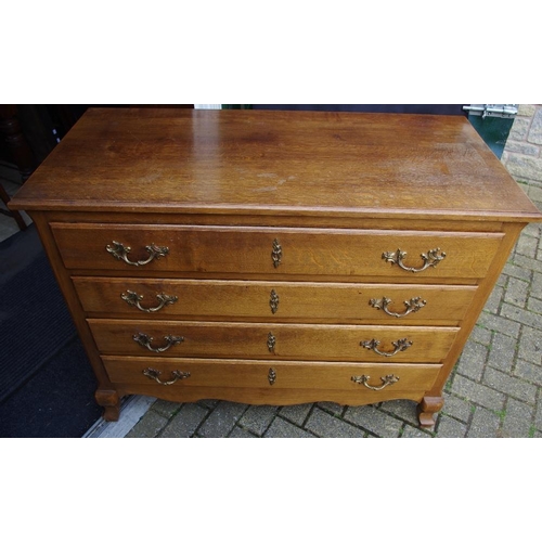 501 - A chest of four long drawers, Louis XVI style handles