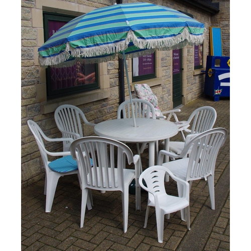 502 - A garden patio set comprising table, parasol, six chairs, a lounger chair and two child's chairs (11... 