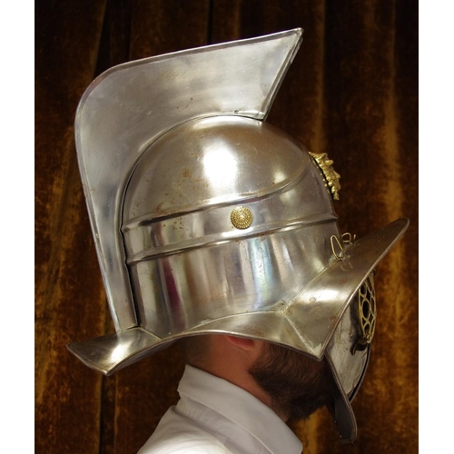 63 - A museum/re-enactment armoured gladiator helmet, Etruscan mask mount, with face guard