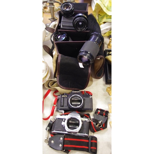 94 - Photographic interest - a Pentax ME super 35mm SLR camera body; another Canon AV-1; a Sigma Zoom - K... 