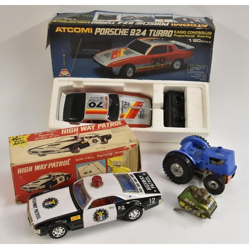 3077 - A Taiyo Toys Highway Patrol Non-Fall Mystery Bump n Go battery operated car, C-33, boxed;  a Yone To... 