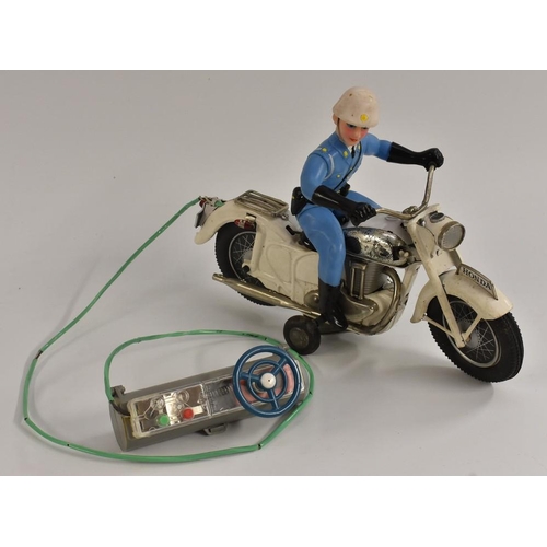 3082 - A vintage Shinsei Asahi (Japan) tin plate and plastic remote control Honda Police Motorcycle, white ... 