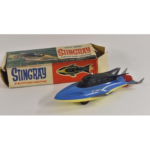 3098 - A 1960s Fairylite Stingray plastic friction drive model,  in two tone blue and yellow. silver fins, ... 