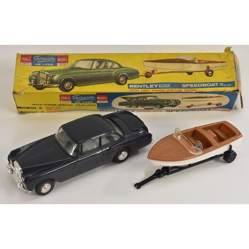 3100 - A Telsalda De Luxe Bentley Sports Saloon with Speed Boat on Trailer set, front wheel drive plastic c... 