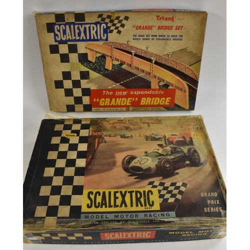 3104 - Scalextric Slot Car Racing - a GP.33 set, inc yellow Lotus MM/C63 and Green Ferrari MM/C62 racing ca... 