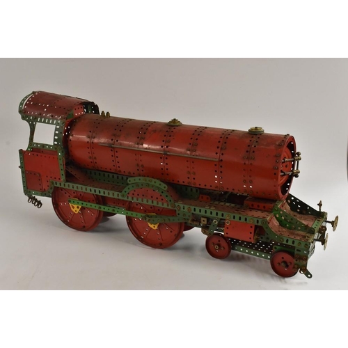 3106 - Meccano Construction Toys - a built locomotive and tender, red and green body, push a long action, s... 