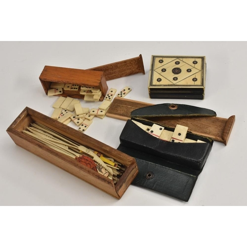 3125 - Games - a 19th century miniature full set of double six bone dominoes, each irregular hand cut, appr... 