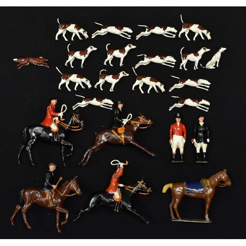 3131 - Britain's Toys - a hollow cast metal huntsman and hounds set inc Hunt Master and Mistress standing, ... 