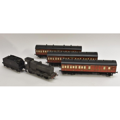 3154 - Lima O Gauge - a 0-6-0 tank locomotive and six wheel tender, BR black livery, Rn 672, three kit buil... 