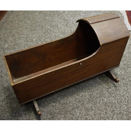 494 - An early 19th century mahogany child's cradle of traditional form with canopy