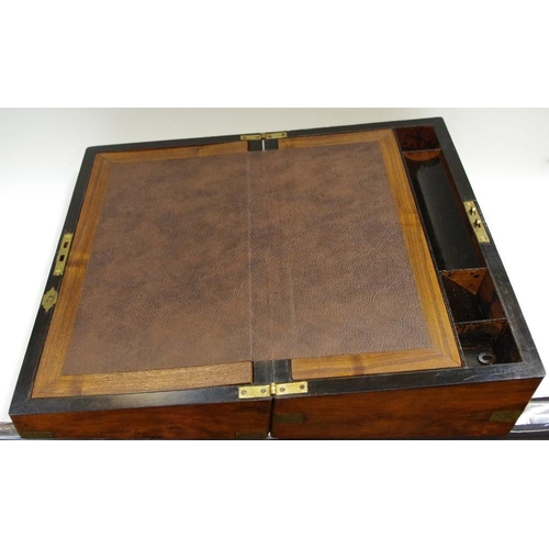 93 - A late 19th century burr walnut and brass mounted writing slope, inlaid brass cartouche; leather wri... 