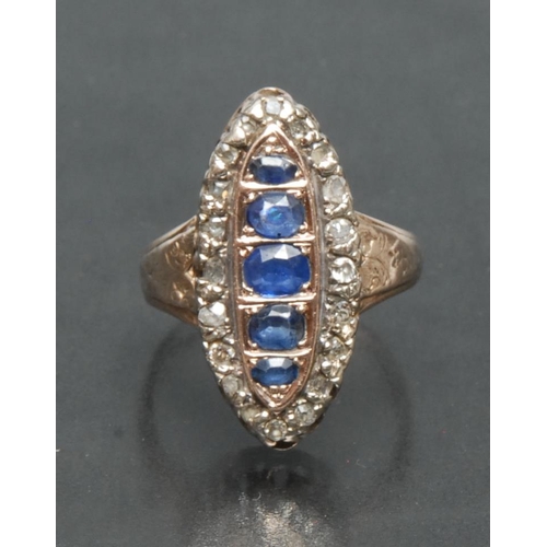 3430 - A diamond, sapphire and spinel cluster ring. central line of five graduated mixed cut blue spinels, ... 