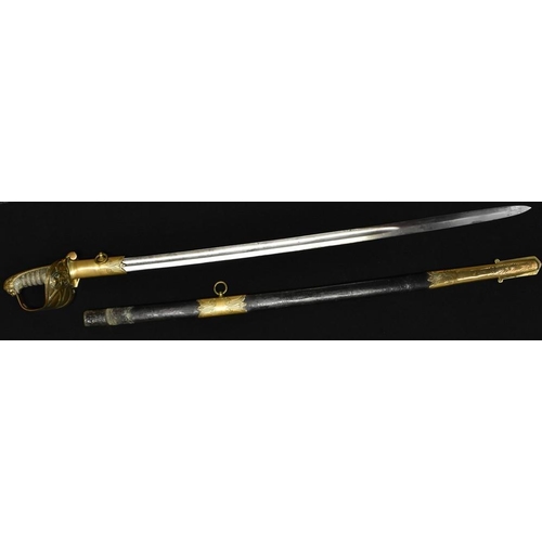 3054 - A Victorian 1827 pattern Royal Naval Officers Sword, 79cm blade named to J.T.FREEMAN R.N,  gilt hilt... 