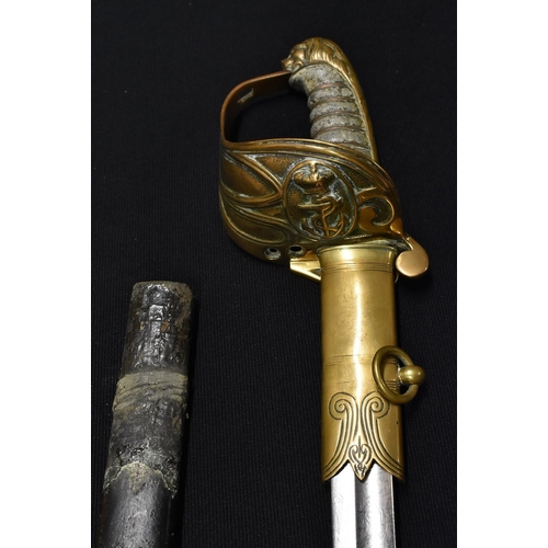 3054 - A Victorian 1827 pattern Royal Naval Officers Sword, 79cm blade named to J.T.FREEMAN R.N,  gilt hilt... 