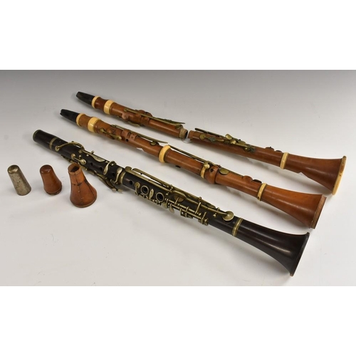 3022 - A 19th century boxwood clarinet, Bilton, London, 59.5cm long, c.1850; another, similar, stamped Gisb... 