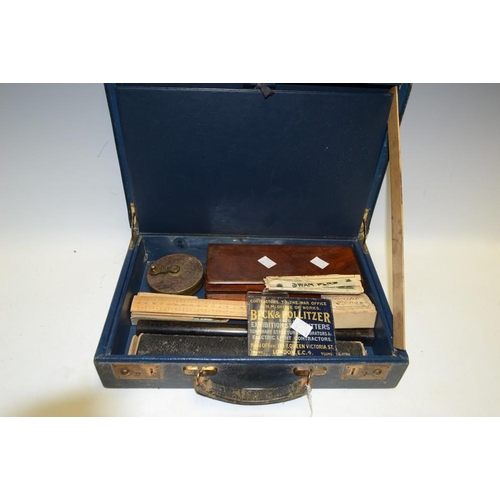 5191 - A blue leather writing case containing fountain pens, advertising blotter, rulers, map roller, etc