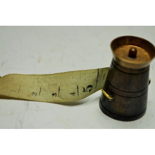 5199 - A Victorian novelty tape measure, as a milk churn