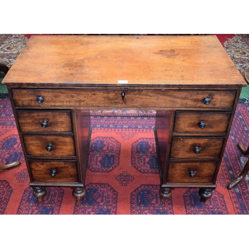 172 - A George III mahogany kneehole desk, rectangular top above an ebony cockbeaded frieze drawer, above ... 