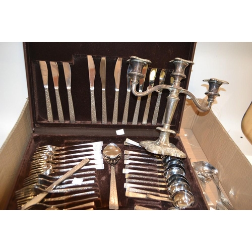 5341 - Metalware - a canteen of stainless steel cutlery, textured bark effect; a plated candelabra; Siamese... 