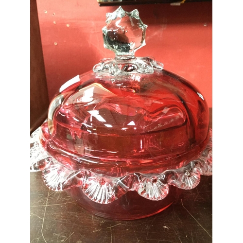 278 - A Victorian Cranberry glass lidded bowl, spiked ball finial; another, similar lidded jar; a Cranberr... 