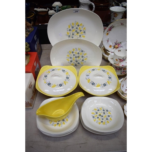 339 - A mid 20th century Midwinter Modern Fashion Shape dinner service, for six, comprising dinner tea and... 