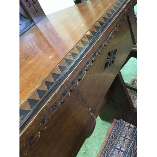 427 - A Reformed Gothic oak console table, shaped gallery, the rectangular top with inlaid dogtooth border... 