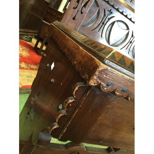 427 - A Reformed Gothic oak console table, shaped gallery, the rectangular top with inlaid dogtooth border... 