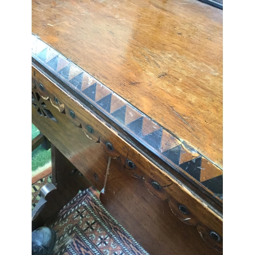 427 - A Reformed Gothic oak console table, shaped gallery, the rectangular top with inlaid dogtooth border... 