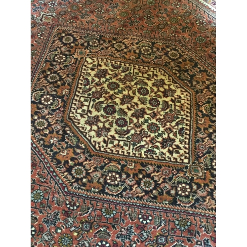 486 - A Middle Eastern style carpet, 177cm x 112cm