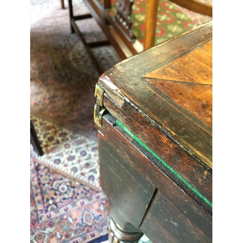 487 - A 19th century mahogany card table, crossbanded hinged top enclosing a baize lined playing surface a... 