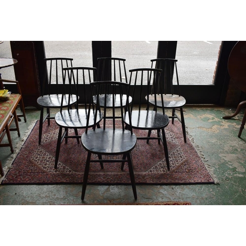 501 - A set of six mid-20th century Danish dining chairs, curved cresting rails, tapered spindle backs, el... 