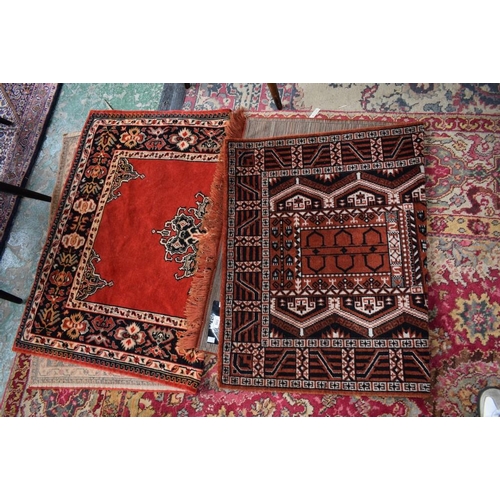 503 - A Middle Eastern style carpet/rug, 136cm x 100cm; another similar (2)