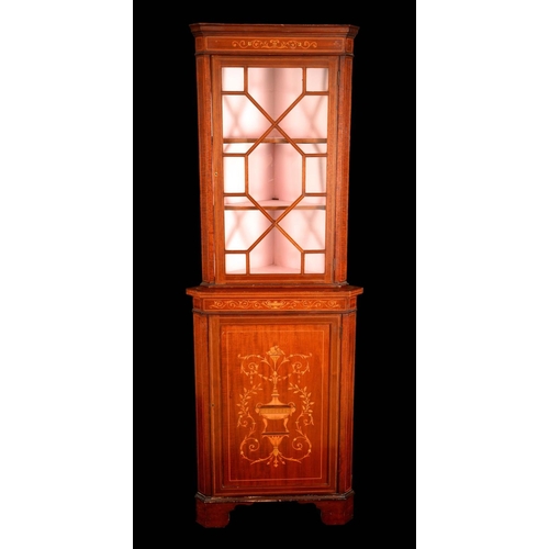 553 - An Edwardian mahogany and marquetry floor standing corner display cabinet, outswept moulded cornice ... 